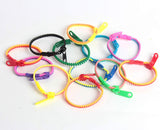 SBYURE - Pulsera de 40 piezas con cierre de cierre, colores neón, sensorial, juego de juguetes para fiestas para estudiantes, niños, cumpleaños, bolsas de dulces, premios pequeños, mixto